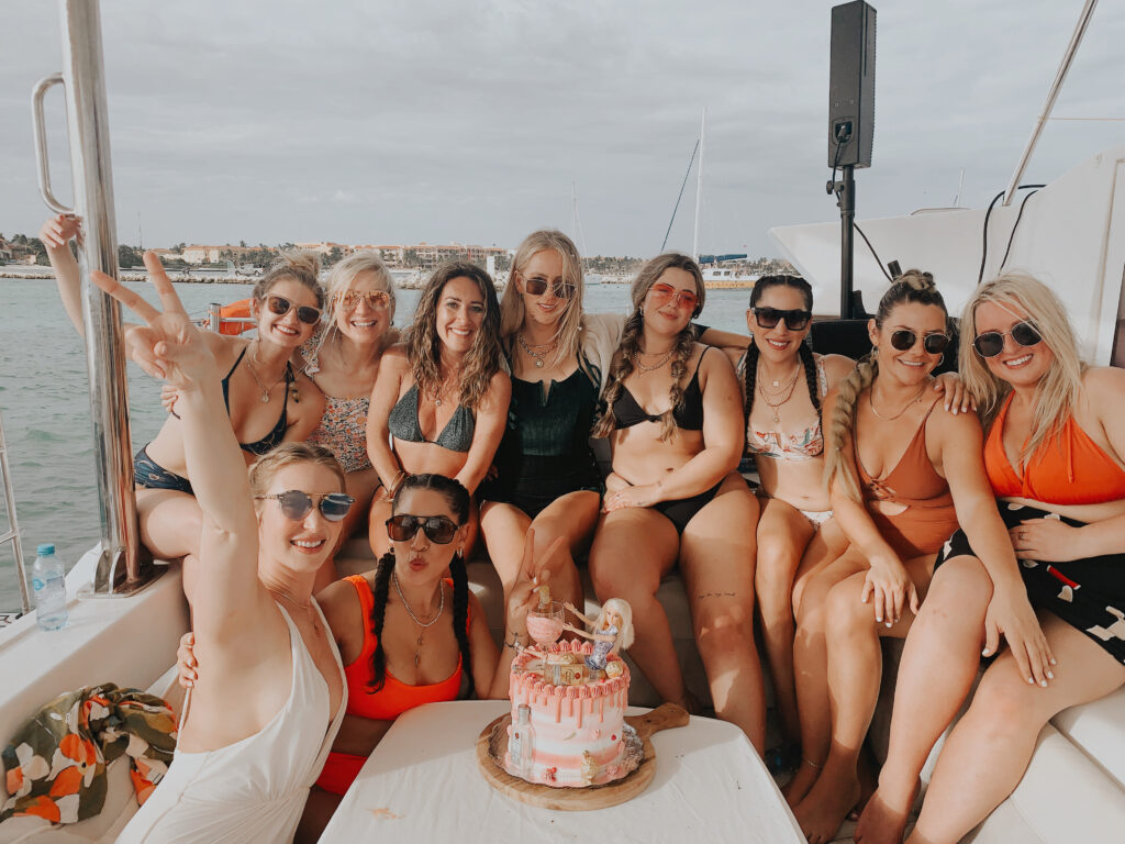 Friends celebrating a special occasion aboard Tulum Yachts