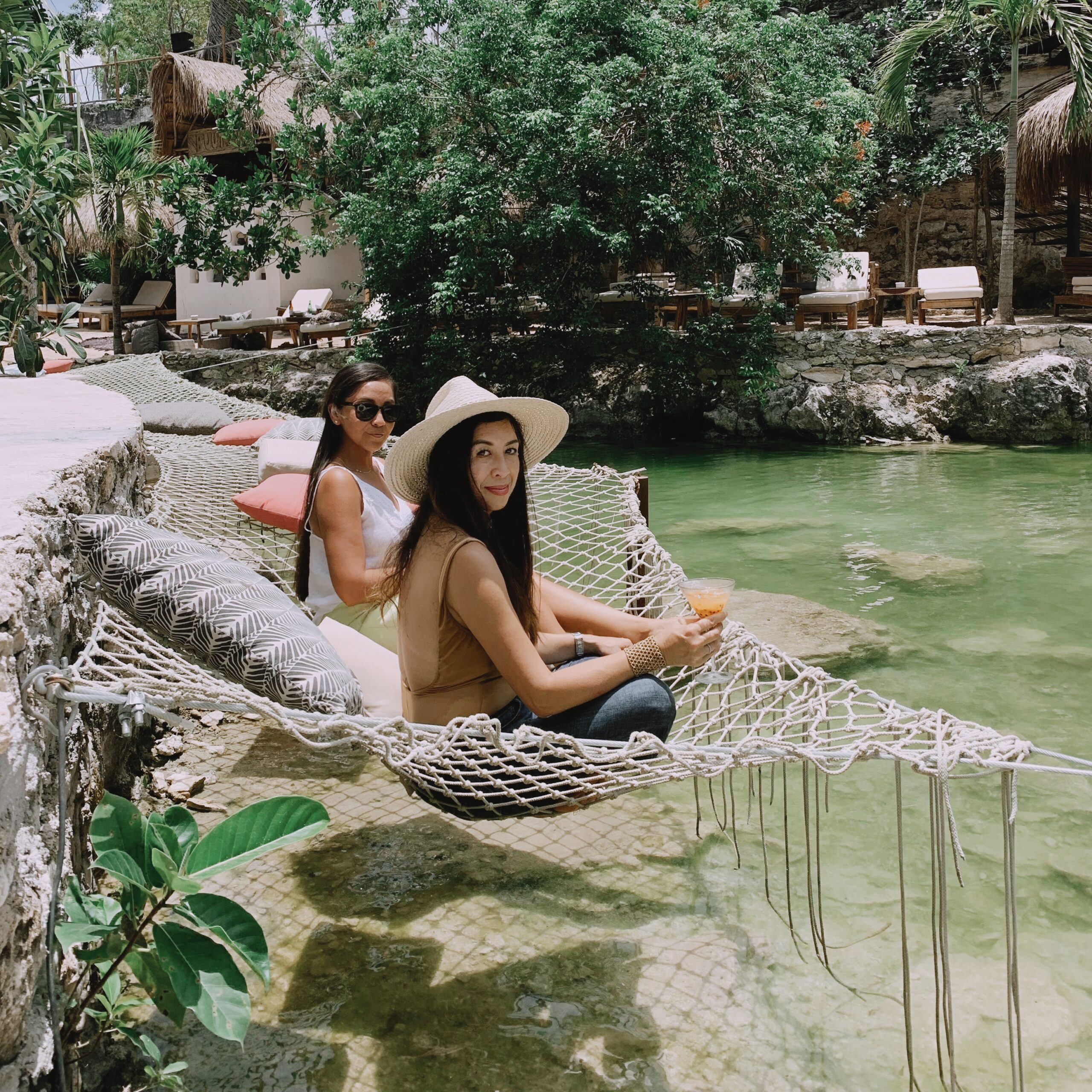 Guests visiting a cenote with private transportation in Tulum