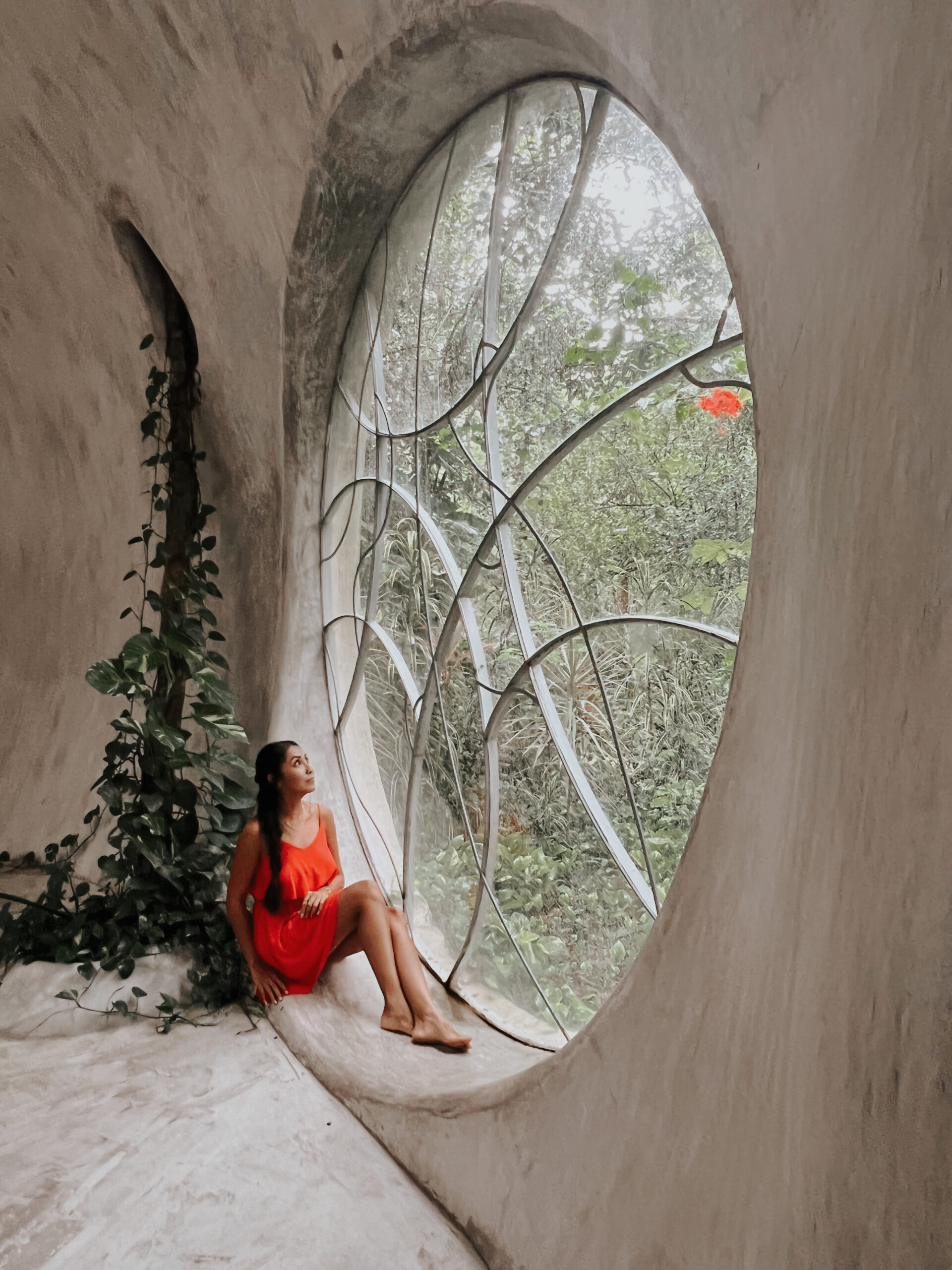 Woman exploring SFER IK Museion during a private day trip from Tulum