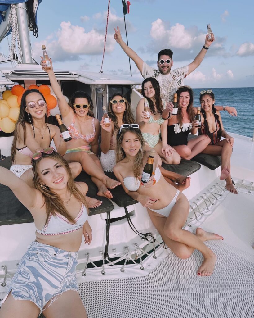 Birthday group enjoying a private yacht charter near Tulum