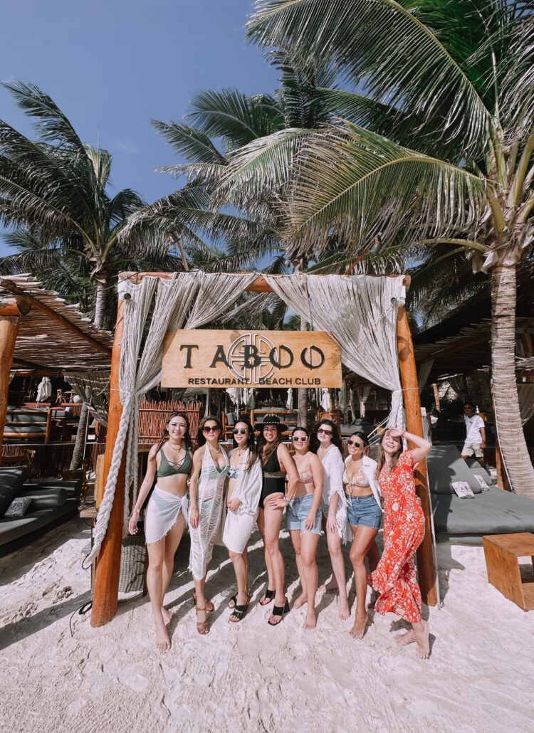 Group of women at Taboo Beach Club Tulum for a birthday weekend getaway.