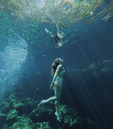 Guests enjoying a private cenote experience in Chemuyil
