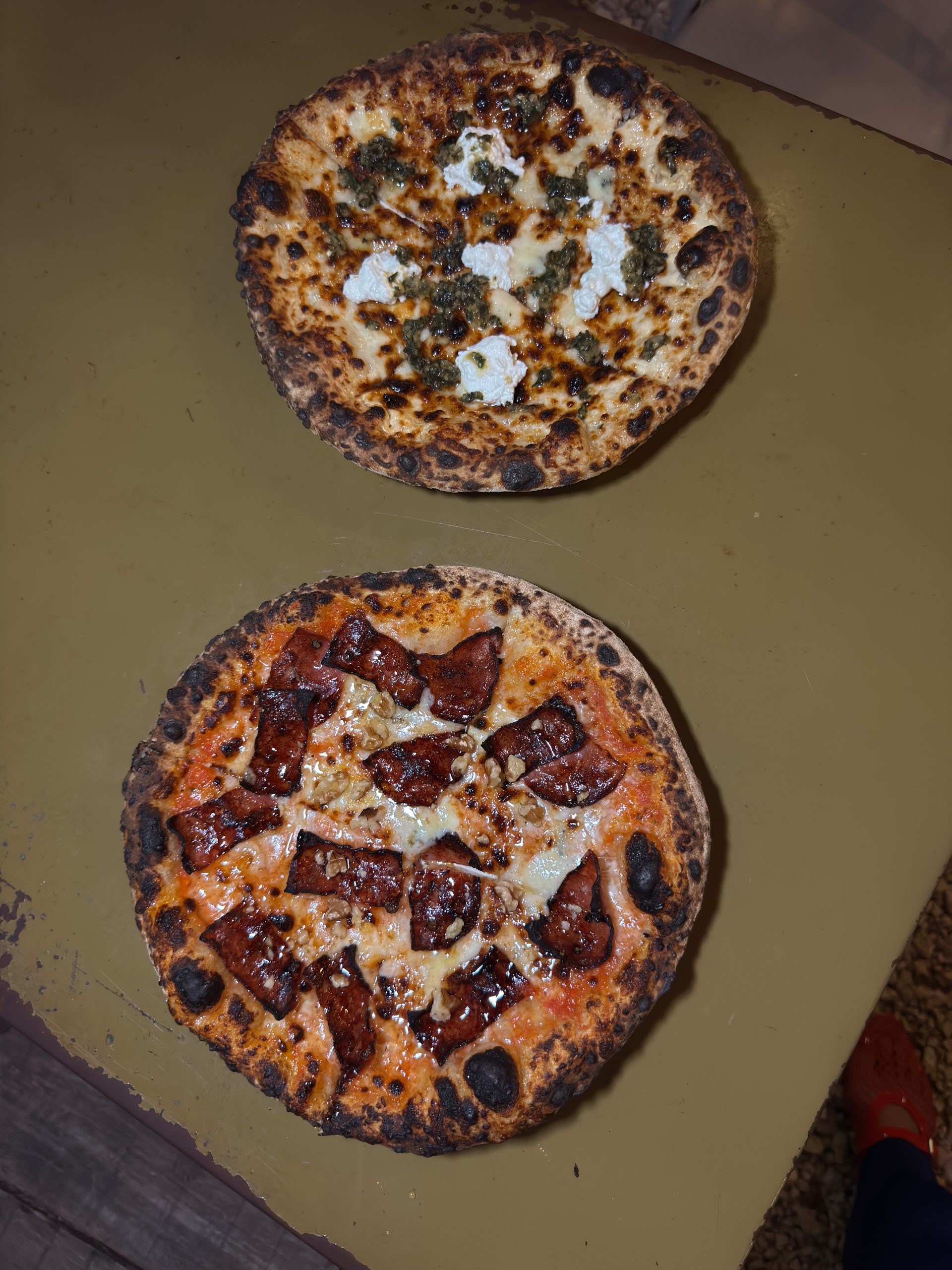 Fresh pizza served during a private pizza night in Tulum